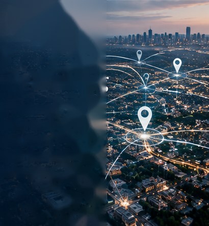 An aerial view of a city at night with connected location pins linking sites across the market